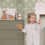 Smiley zonnetjes behang voor de kinderkamer van Annet Weelink off groen geel