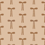 May and Fay behang voor de babykamer meisjeskamer strikjes beige