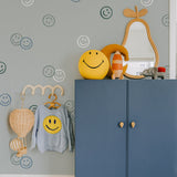 Smiley behang smiley confetti volpracht jongenskamer blauw